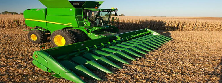 Large tractor ploughing a field