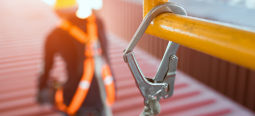 man clipped in for safety to avoid falling